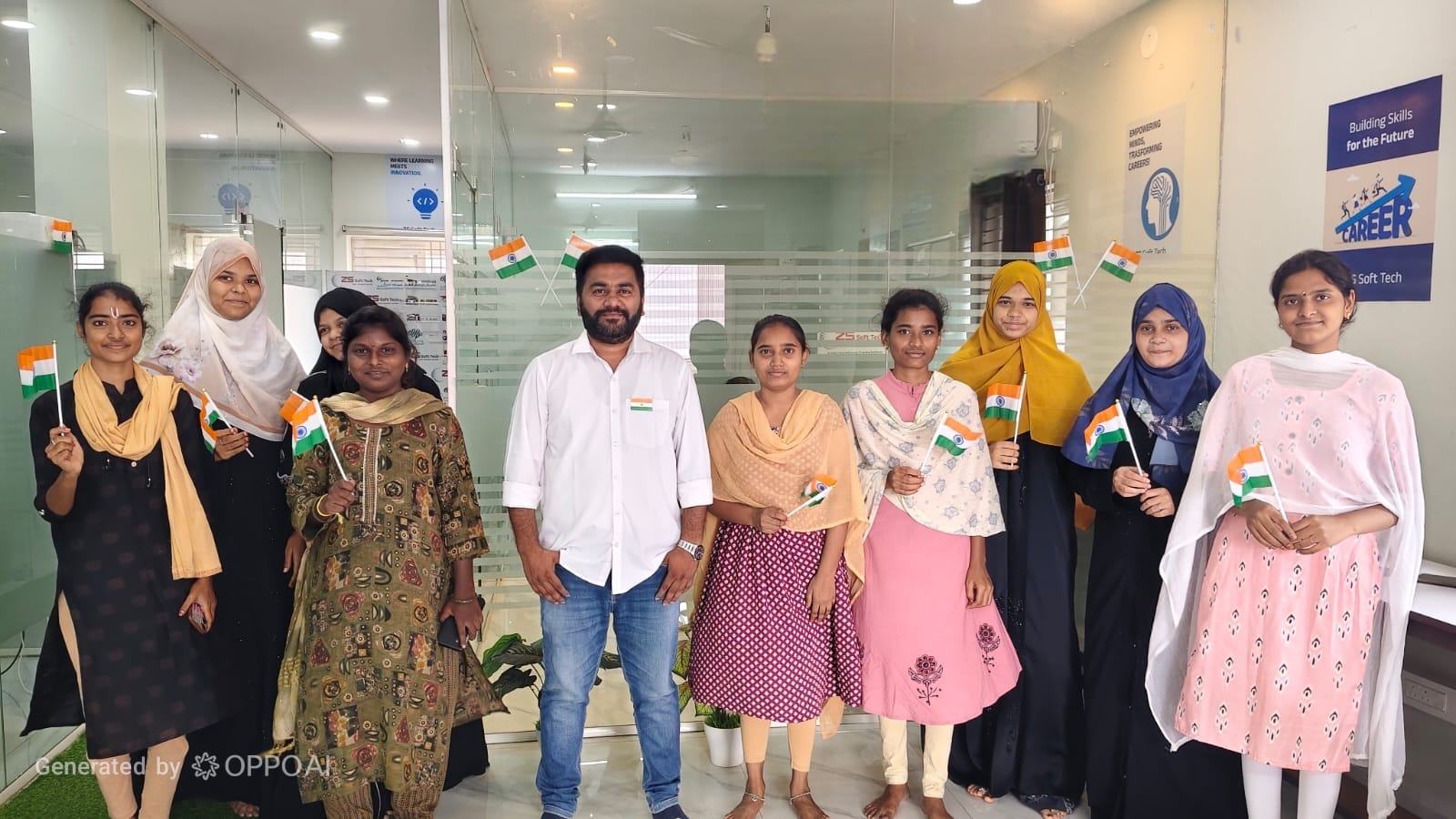 Team celebration with Indian flags at the office